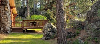 Two story authentic log construction home, built in 1936 with two fireplaces.