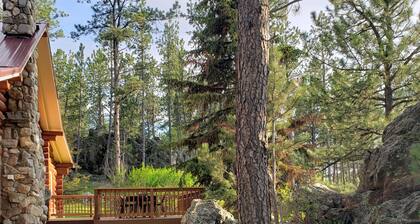 Two story authentic log construction home, built in 1936 with two fireplaces.