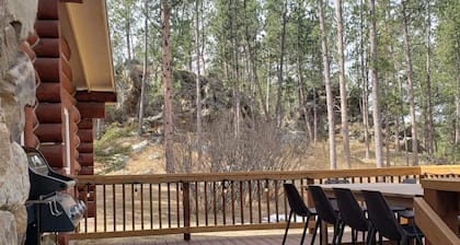 Two story authentic log construction home, built in 1936 with two fireplaces.