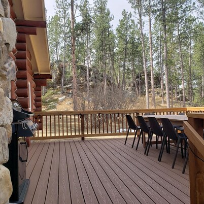 Two story authentic log construction home, built in 1936 with two fireplaces.