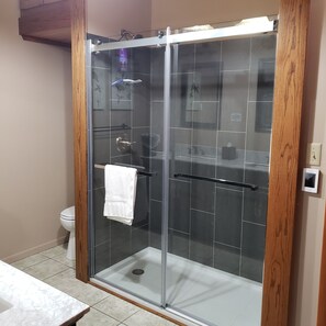 Combined shower/tub, hair dryer, towels, soap