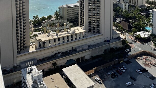 A high-rise hotel with a view of the ocean. - Pacific Monarch Top Floor Condo with Ocean, City and Mountain Views! (Honolulu)