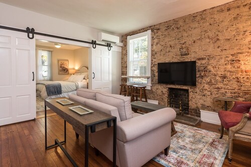 French Cottage Apt | Luxury Extended Stay in Downtown Belmont