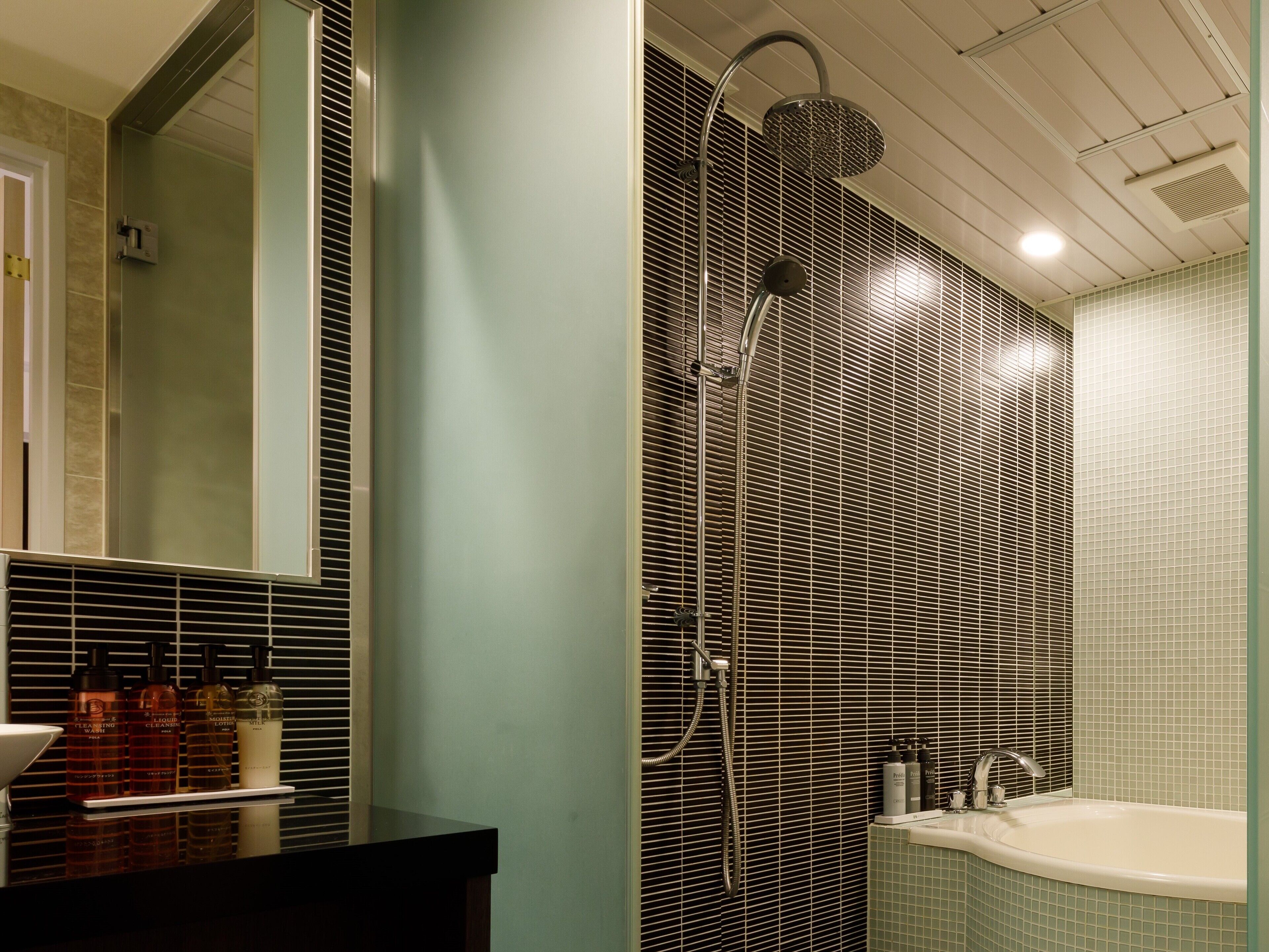 junior studio suite | bathroom | free toiletries, hair dryer, slippers, electronic bidet