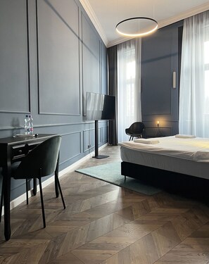 Chambre Deluxe | Coffres-forts dans les chambres, fer et planche à repasser