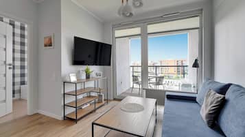 Superior Apartment | Living area | 37-inch flat-screen TV with satellite channels, TV, streaming services
