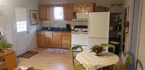 Microwave, coffee/tea maker, cookware/dishes/utensils