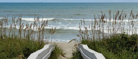 On the beach, sun-loungers, beach towels