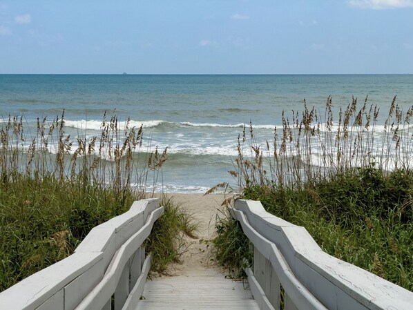 On the beach, sun loungers, beach towels