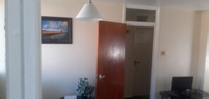 Apartamento, várias camas | 1 quarto, ferros/tábuas de passar roupa, Wi-Fi de cortesia