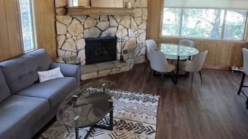 TV, fireplace, books, stereo