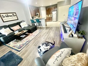 Smart TV, fireplace, books
