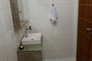 Shower, towels, toilet paper