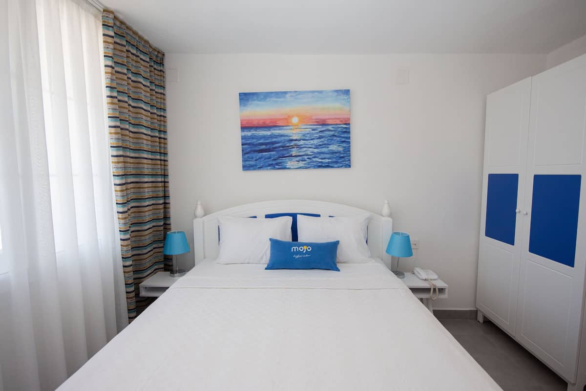 Luxe beddengoed, een kluis op de kamer, verduisterende gordijnen
