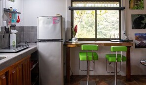 Fridge, microwave, stovetop, coffee/tea maker