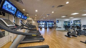 A gym with treadmills, stationary bikes, and weight machines. - Westgate Orlando Deluxe Villa, 4 Bedroom, 16 max occupancy (Kissimmee)