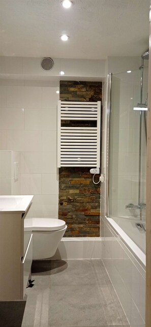 Hair dryer, soap, shampoo, toilet paper