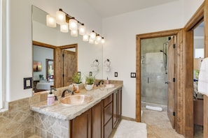 Bathtub, hair dryer, towels, soap