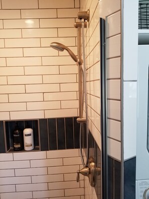 Shower, hair dryer, towels, soap - Modern Studio with Washer & Dryer (Layton)