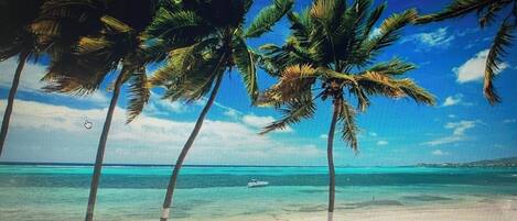 Espreguiçadeiras, toalhas de praia