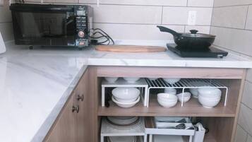 Fridge, microwave, stovetop, cookware/dishes/utensils