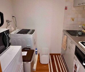 Fridge, microwave, cookware/dishes/utensils
