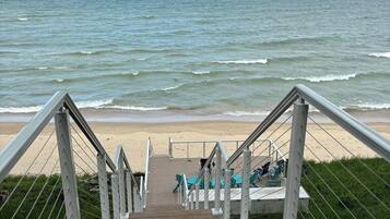 On the beach, sun loungers, beach towels