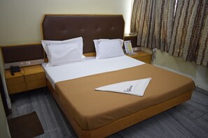 Economy Room (Non AC) | Premium bedding, free WiFi, bed sheets