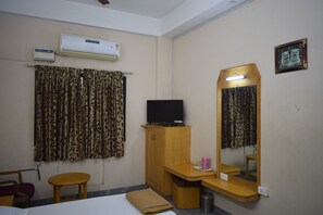 Economy Room (Non AC) | Premium bedding, free WiFi, bed sheets