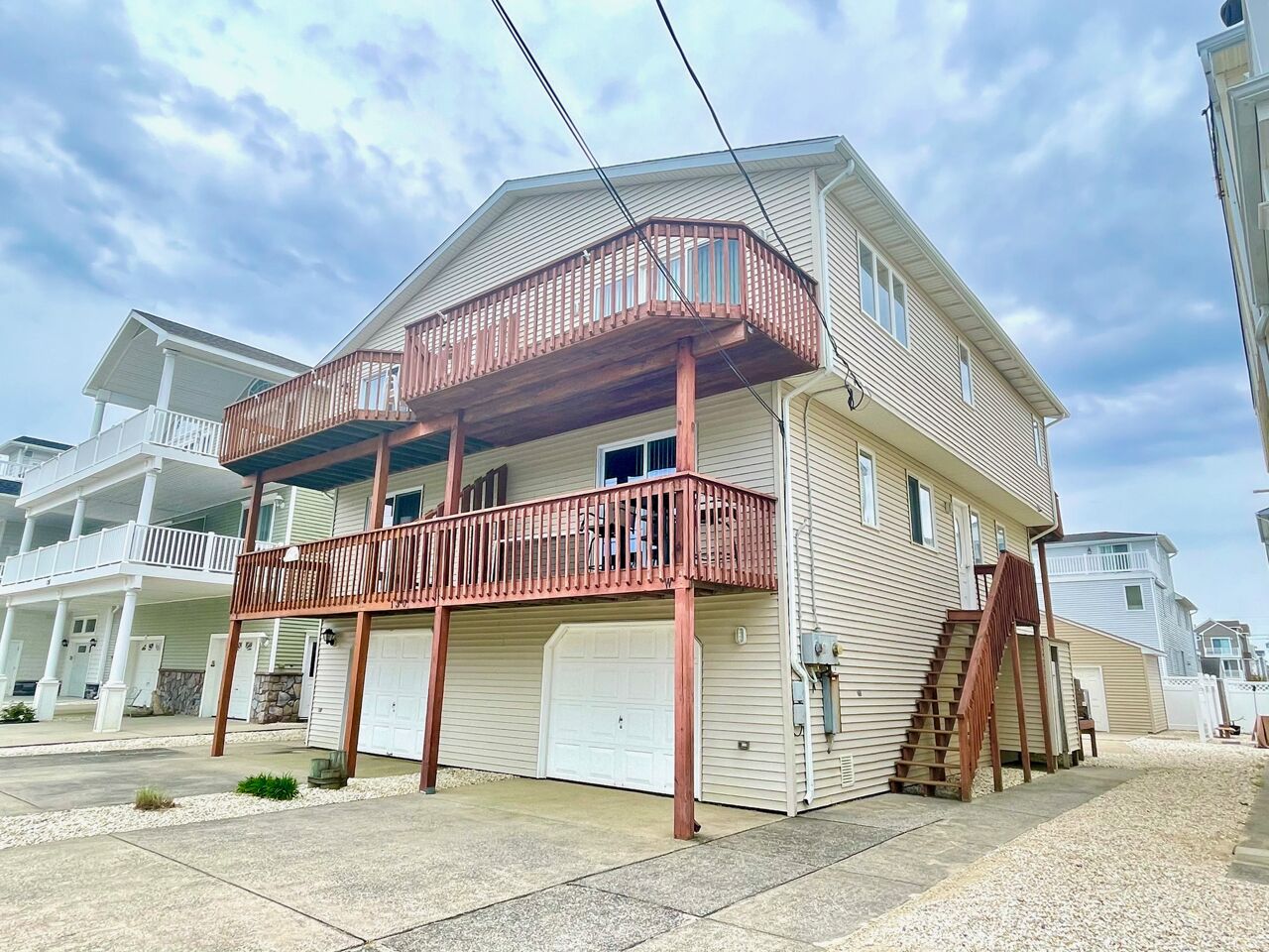 Large slider leading to deck which offers some views of both the ocean and bay!!