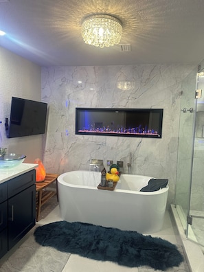 Combined shower/tub, jetted tub, hair dryer, bidet