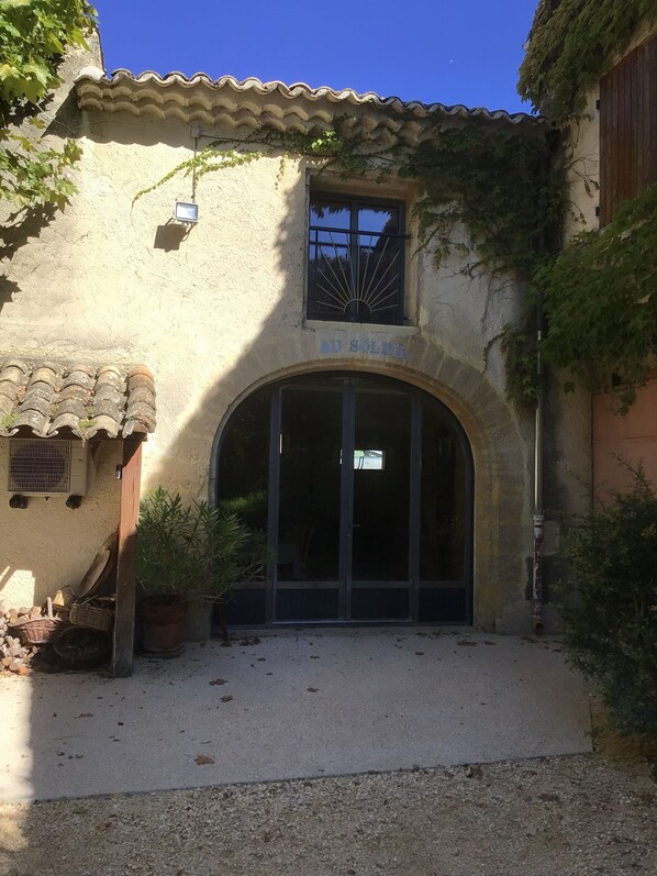 Traditional architecture meets serene surroundings in this charming building.