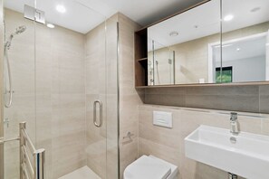 Shower, hair dryer, towels