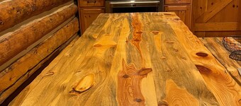 Lena's Cabin in Vail is nestled right beside Gore Creek,  minutes from skiing.