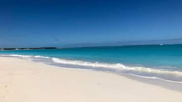 On the beach, sun-loungers, beach towels