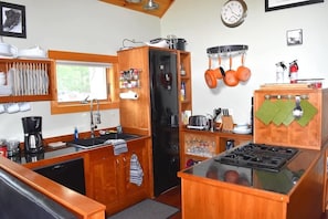Coffee/tea maker, fridge, microwave, oven