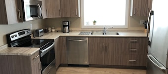 Legal 2 bedroom suite conforms to the new 2024 Short Term Rental Regulations. 
