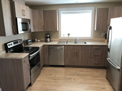 Legal 2 bedroom suite conforms to the new 2024 Short Term Rental Regulations. 