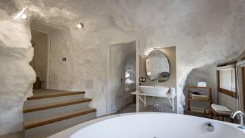Jetted tub, hair dryer, towels, soap