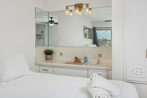 7 bedrooms, memory-foam beds, blackout curtains, iron/ironing board