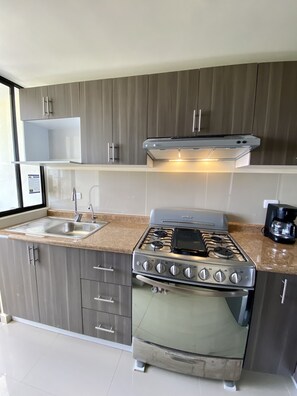 Fridge, microwave, oven, stovetop