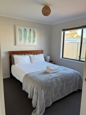 4 bedrooms, desk, iron/ironing board, travel cot