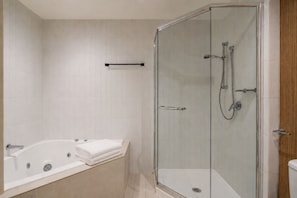 Bathtub, hair dryer, towels