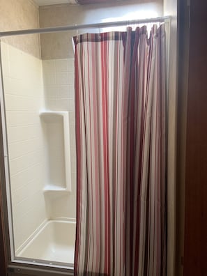 Combined shower/bathtub