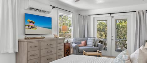 Tabla de planchar con plancha, wifi gratis y ropa de cama