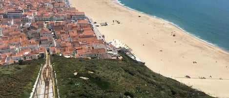Na praia, toalhas de praia