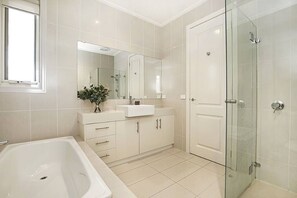 Bathtub, hair dryer, towels
