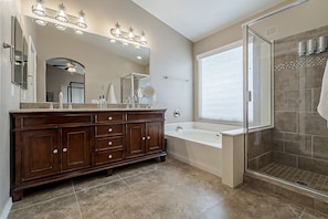 Combined shower/bathtub, hair dryer, towels, soap