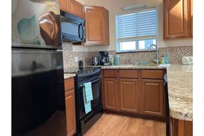 Fridge, microwave, oven, stovetop - Golf Colony Resort condo near Myrtle Beach (Little River)