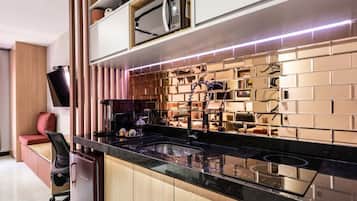 Fridge, stovetop, toaster, cookware/dishes/utensils